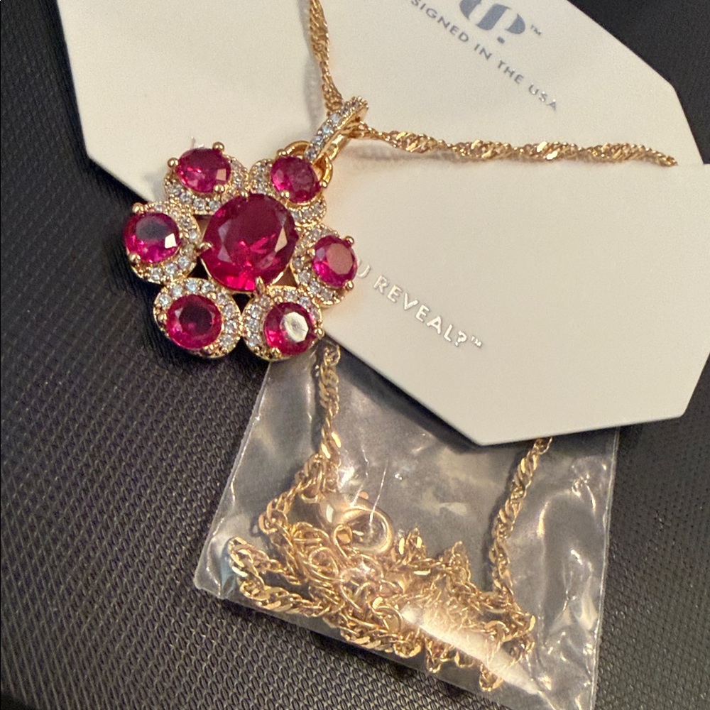 Elegant Gold Necklace with Pink Accents